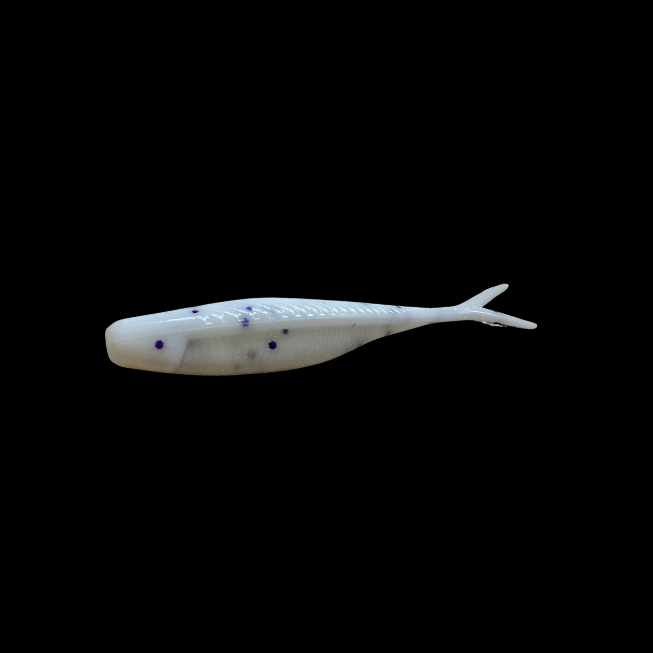 4-inch Tracer Shad Soft Bait used for bass fishing, featuring a slender, fish-like design with a split tail for realistic darting action to attract bass. white and purple